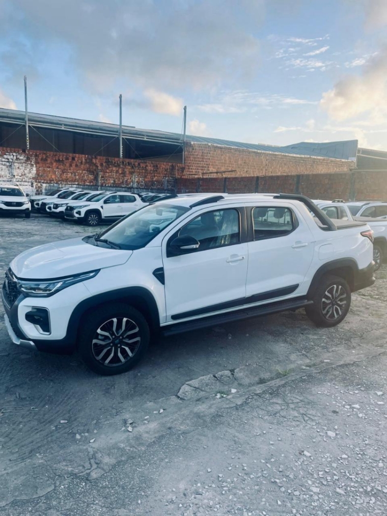 fiat strada ranch cabine dupla motor t-200 de 130cv flex 2025/2026 148.530,00 por r$139.990,00 fiat strada ranch cabine dupla motor t-200 de 130cv flex 2025/2026 148.530,00 por r$139.990,00