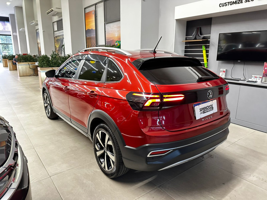 volkswagen nivus highline turbo 200 tsi revisado vermelho metalico automatico super novo2
