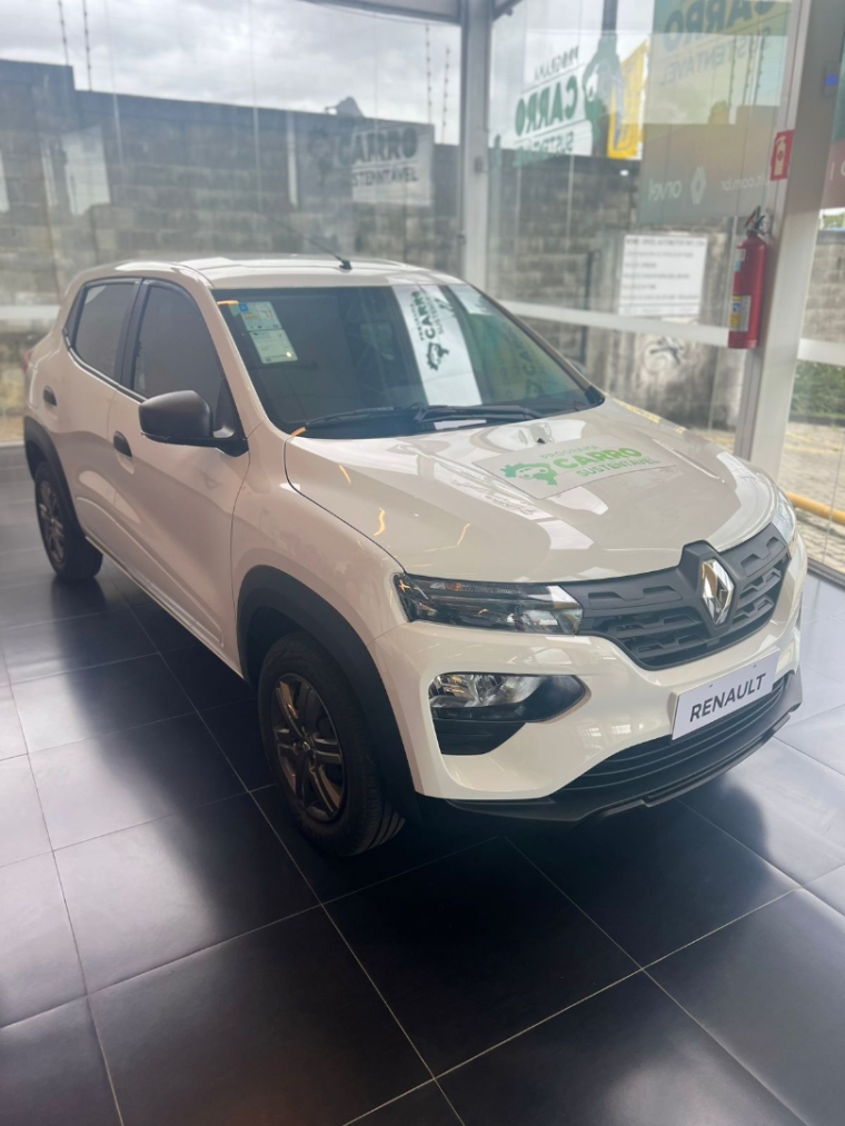 kwid zen 2026 com central multimidia + camera de re sensor estacionamento insulfilme e emplacamento total 2025 pago.