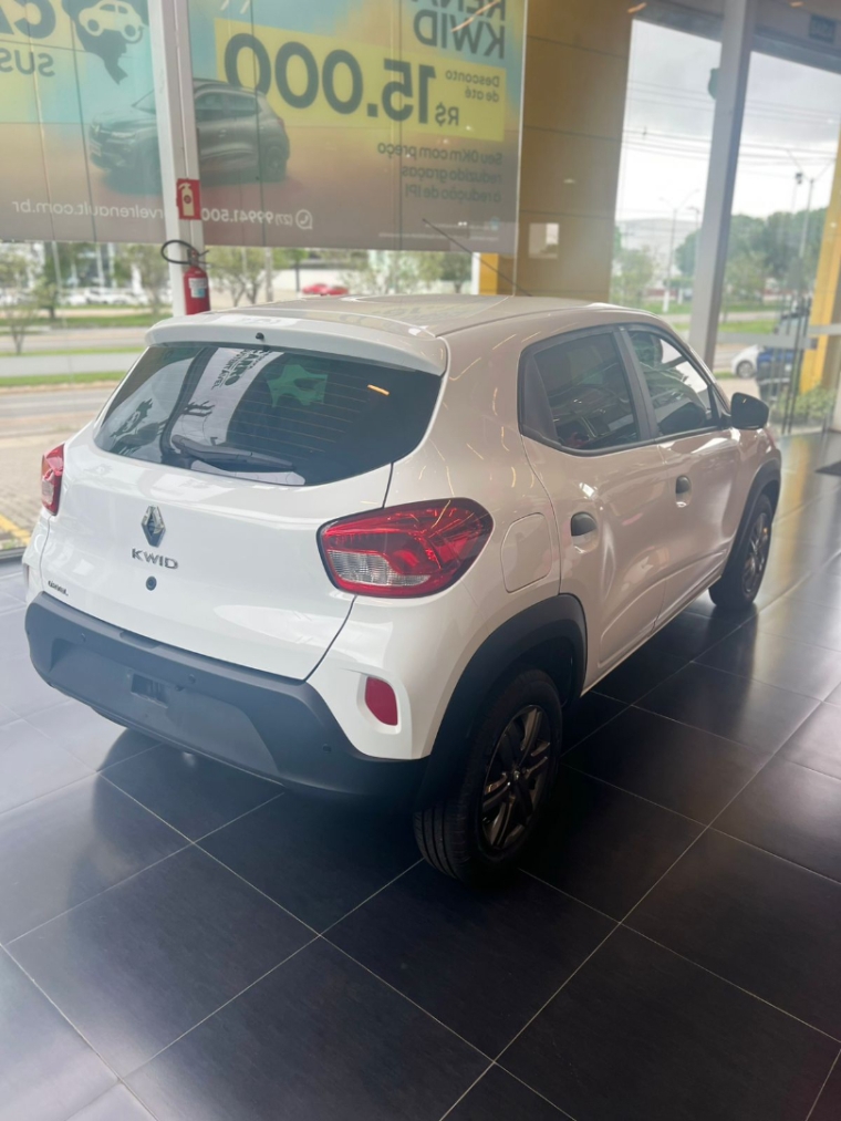 kwid zen 2026 com central multimidia + camera de re sensor estacionamento insulfilme e emplacamento total 2025 pago.3 kwid zen 2026 com central multimidia + camera de re sensor estacionamento insulfilme e emplacamento total 2025 pago.3