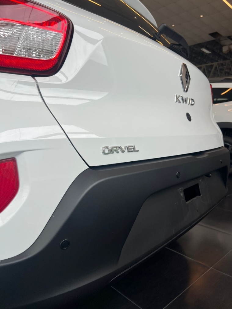 kwid zen 2026 com central multimidia + camera de re sensor estacionamento insulfilme e emplacamento total 2025 pago.5 kwid zen 2026 com central multimidia + camera de re sensor estacionamento insulfilme e emplacamento total 2025 pago.5