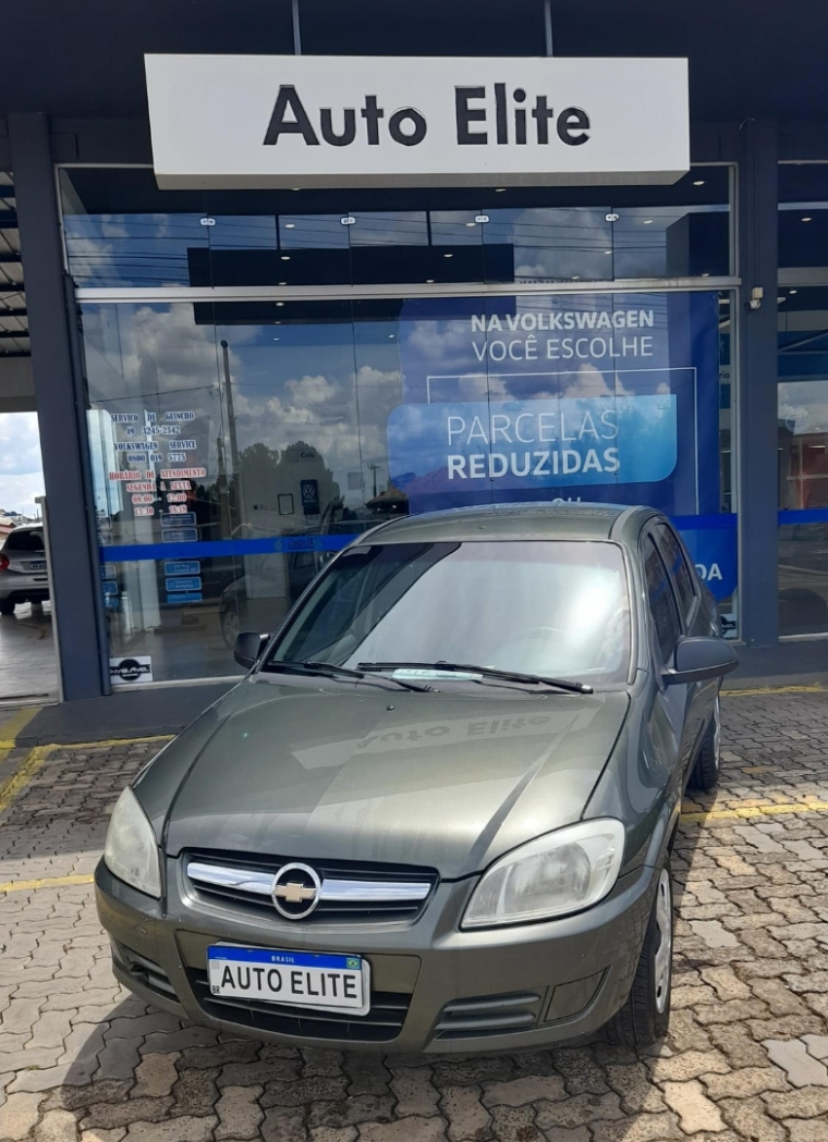 gm/prsima maxx 1.0,2009/2010,verde com ar quente e som