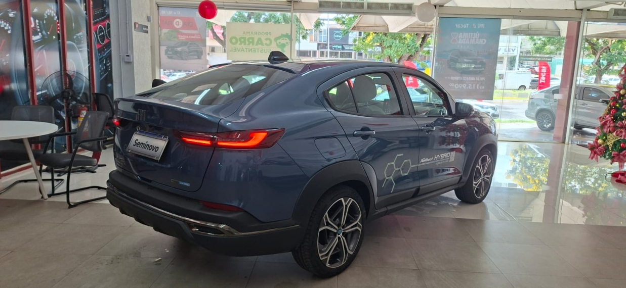 fastback impetus hybrid  seminovo ,limpa patio de teste drive16