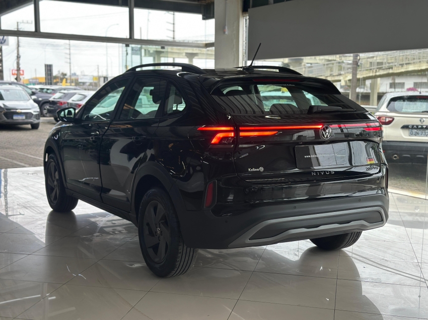 volkswagen nivus 1.0 200 tsi total flex comfortline automatico 4p manual 2025