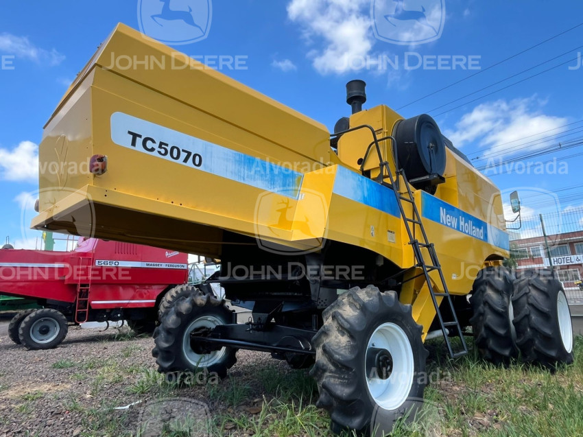 new holland - colhietadeira mod. tc 5070 / plataforma de corte 17 pes rigida ano 20081