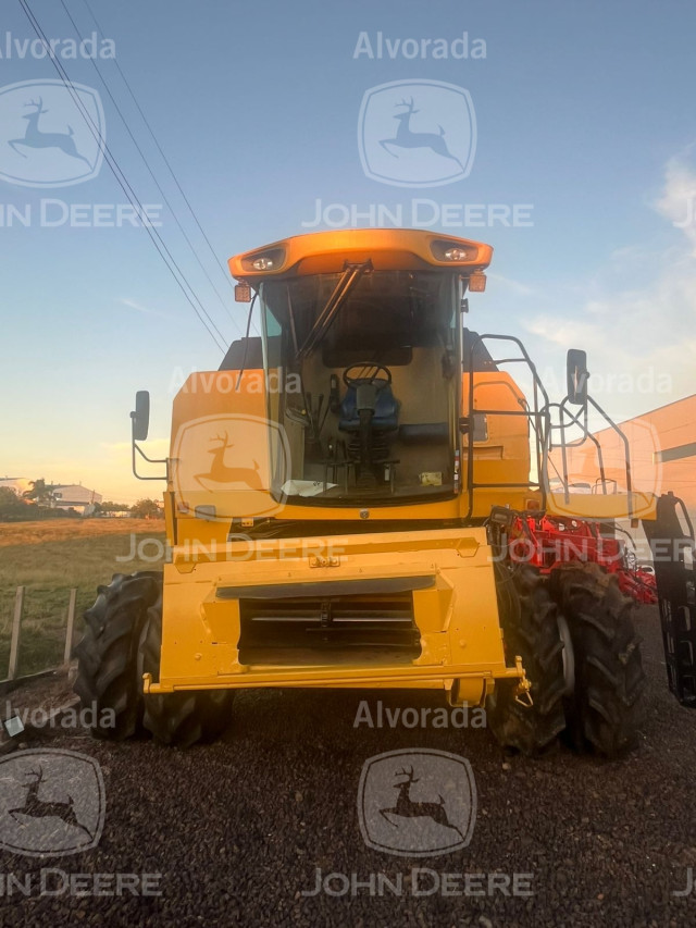 new holland - colhietadeira mod. tc 5070 / plataforma de corte 17 pes rigida ano 20086