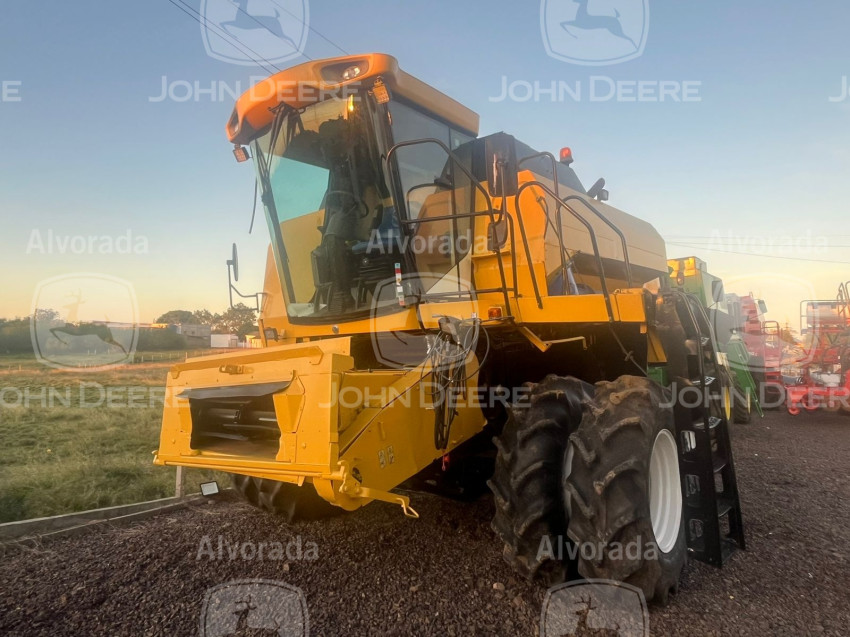 new holland - colhietadeira mod. tc 5070 / plataforma de corte 17 pes rigida ano 20085